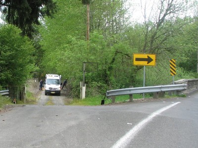 pulling cyclist out of the Pudding River