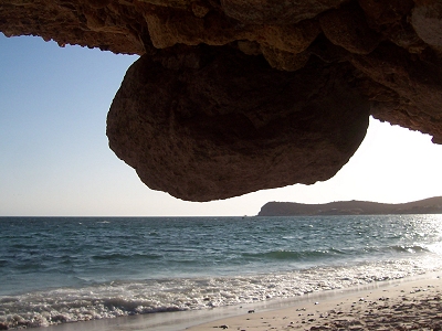 [Hanging rock in little cave at one of the beaches at San Carlos]