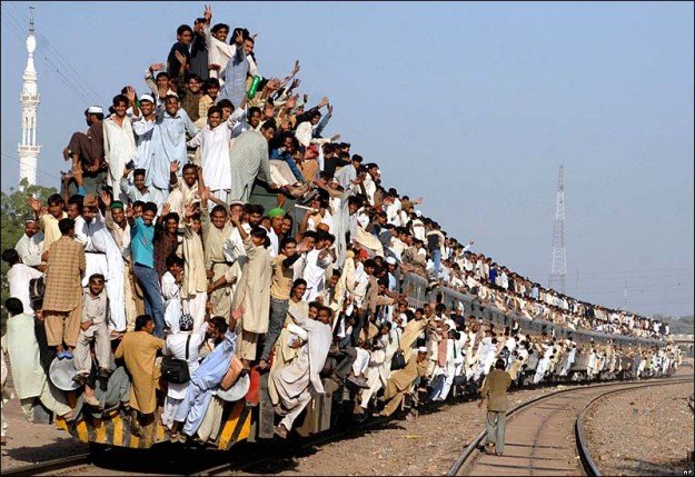 image: overcrowded train